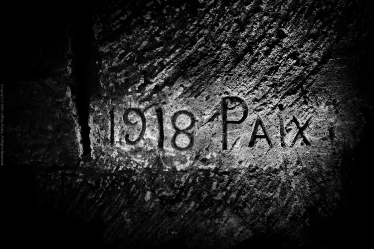 In 1918, a French soldier carved paix – French for peace – into the wall of an underground city along the western front of WWI. Though probably signifying the Armistice that year, historians say that Christmas peace was very much on the minds of all soldiers during their first Christmas at war four years earlier. Copyright 2011-2014 Jeffrey Gusky. All Rights Reserved.